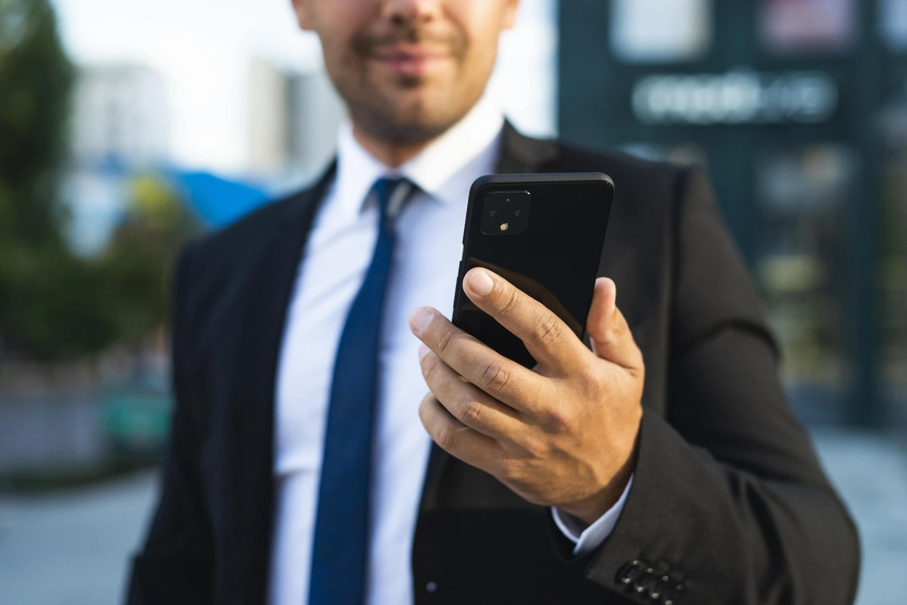Businessman using mobile phone